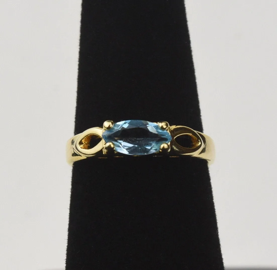 Gold Tone Sterling Silver Ring with Marquise Cut Light Blue Stone - Size 5