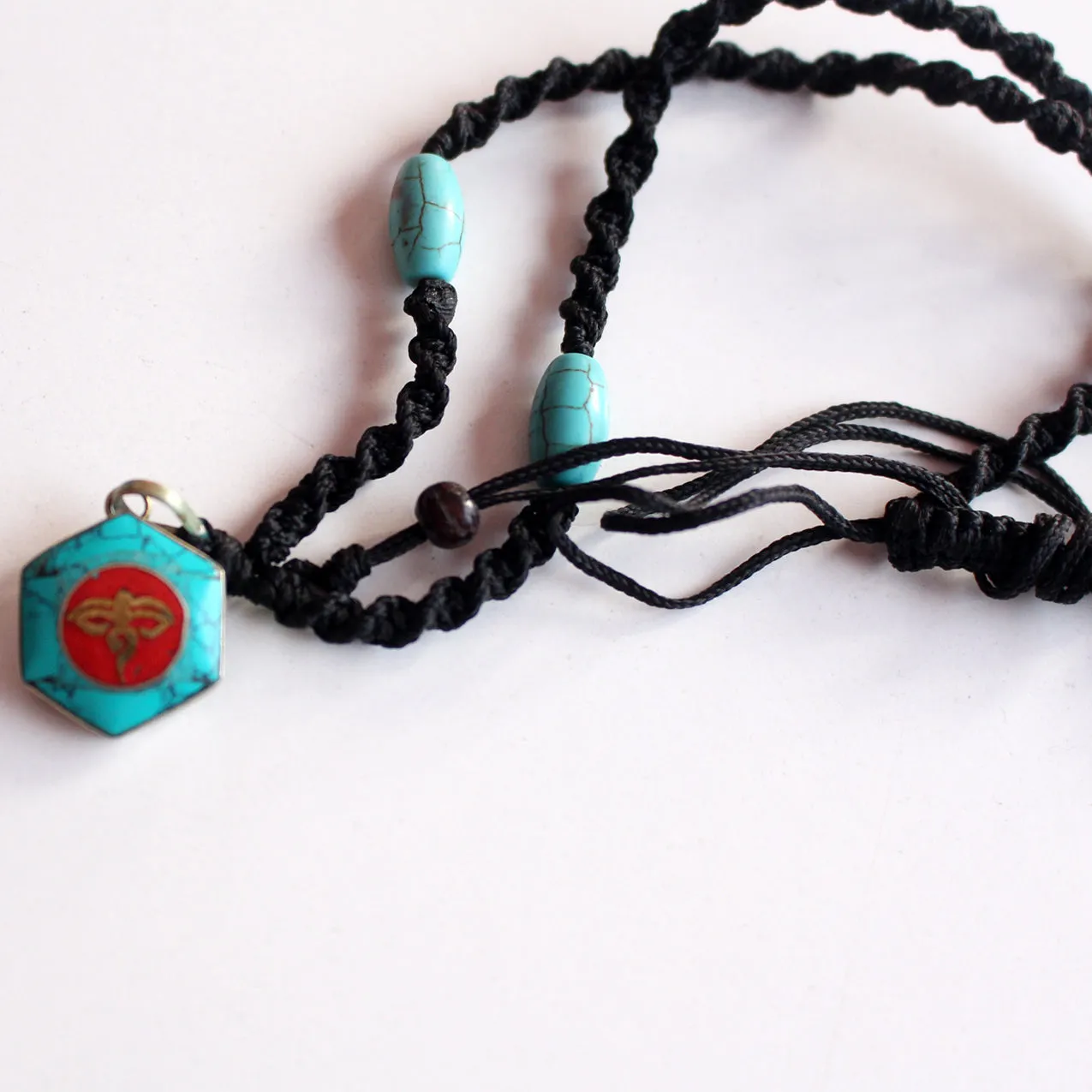 Hexagonal Turquoise Buddha Eye Pendant