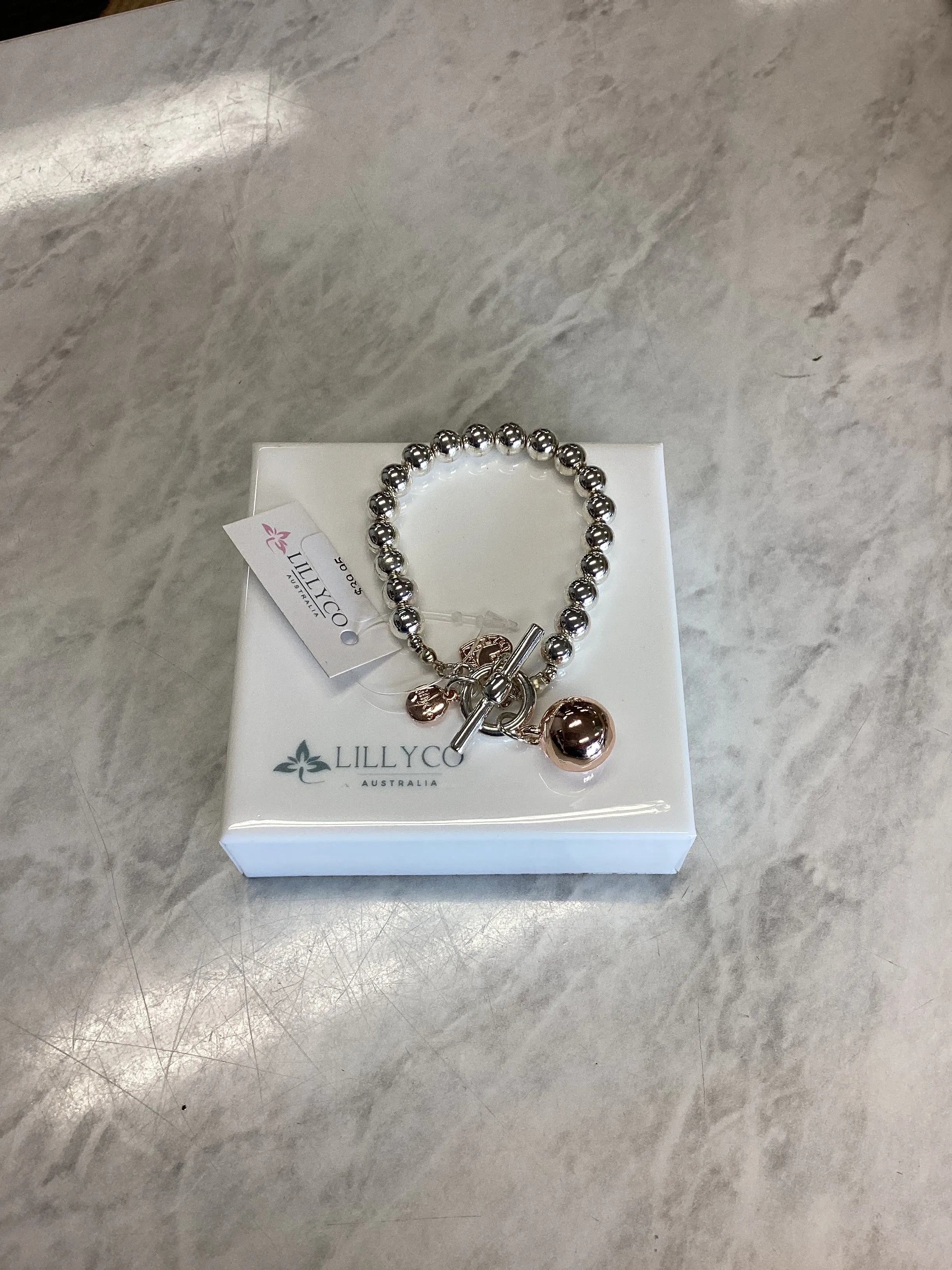 Rose Gold Ball Pendant on Silver bead Bracelet